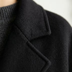 Cappotto di lana da donna con colletto a revers e cintura