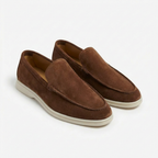 Men’s slip-on loafers with visible stitching and contrasting sole