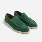 Men’s slip-on loafers with visible stitching and contrasting sole