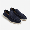 Men’s slip-on loafers with visible stitching and contrasting sole