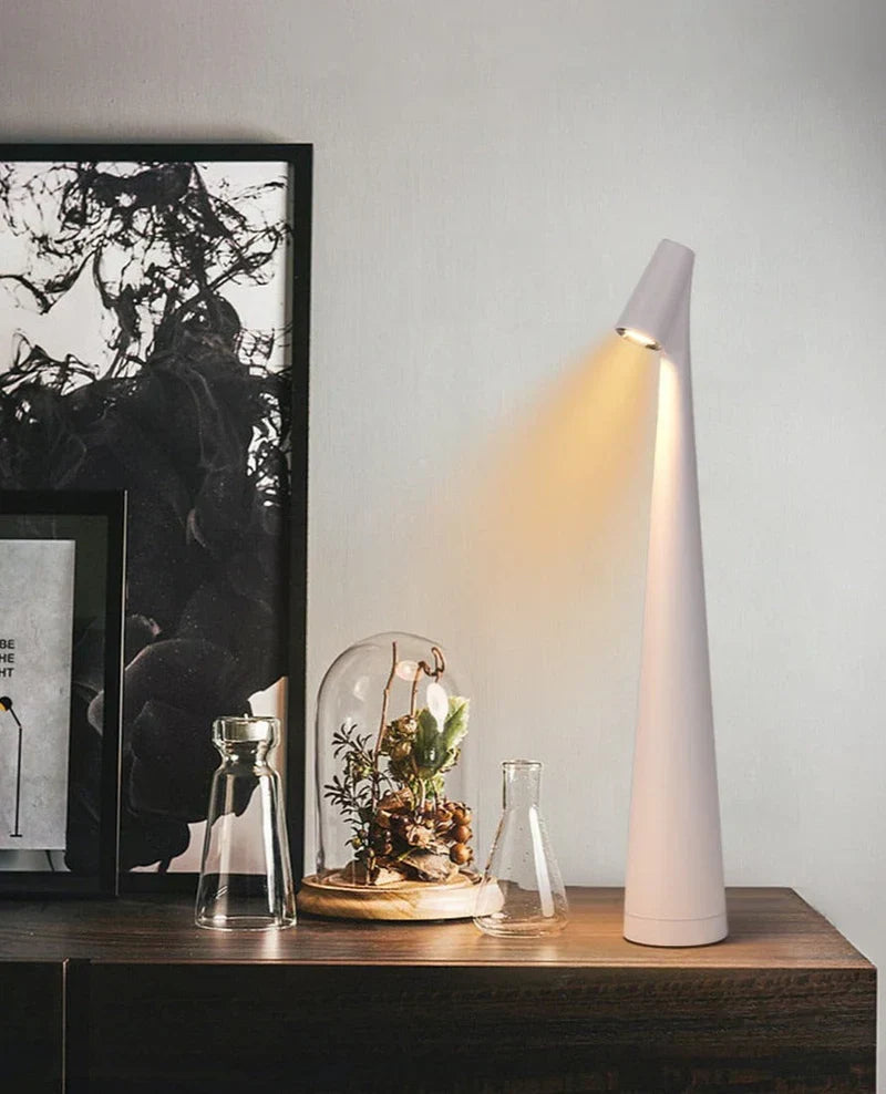 Rechargeable wireless table lamp with a slim base, available in several sizes