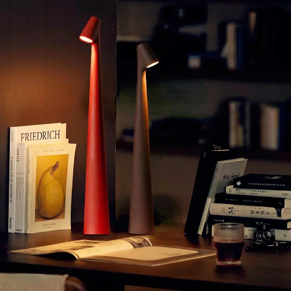 Rechargeable wireless table lamp with a slim base, available in several sizes