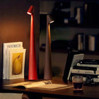 Rechargeable wireless table lamp with a slim base, available in several sizes