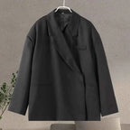 Women's oversized blazer with classic lapels and a relaxed fit