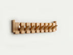Porte-manteau en bois design piano pour entrée et couloir
